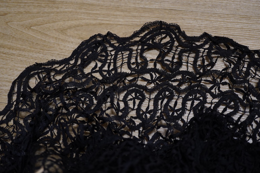 A pair of Chinese silk embroidered sleeve bands and a small collection of black lace stoles, etc.